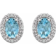 Load image into Gallery viewer, Sterling Silver Sky Blue Topaz &amp; .025 CTW Diamond Earrings
